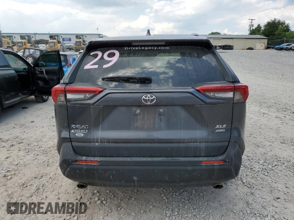 2019 Toyota RAV4 XLE with VIN JTMP1RFV8KD013125, listed as a Copart auction lot 59328465 with 106,947 mi miles and Salvage title. Bid and sale history available at DreamBid. Image 6.