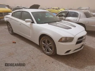 2014 Dodge Charger SXT with VIN 2C3CDXJG4EH232419, listed as a IAAI auction lot 41791324 with 127,910 mi miles. Bid and sale history available at carsss.com. Image 1.