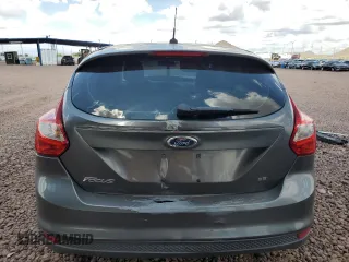 2012 Ford Focus SE z VIN 1FAHP3K24CL338153, wystawiony jako Copart lot #56161925 z przebiegiem 167 146 mil mil oraz Szkoda całkowita • Salvage title. Historia ofert i sprzedaży dostępna na DreamBid. Obrazek 6.