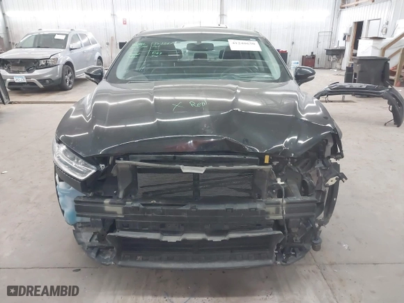 2015 Ford Fusion Titanium Hybrid with VIN 3FA6P0RU2FR309074, listed as a IAAI auction lot 41240630 with 172,025 mi miles. Bid and sale history available at carsss.com. Image 13.