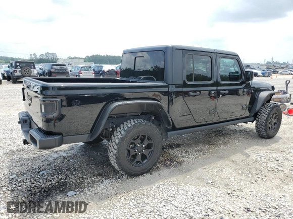 2023 Jeep Gladiator Sport S with VIN 1C6HJTAG9PL525183, listed as a Copart auction lot 54556735 with 13,805 mi miles and Salvage title. Bid and sale history available at DreamBid. Image 3.