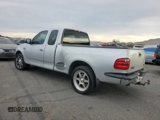 2001 Ford F-150 XL with VIN 1FTRX07W21KE96082, listed as a Copart auction lot 85167754 with 0 mi miles and Salvage Title. Bid and sale history available at carsss.com. Image 2.