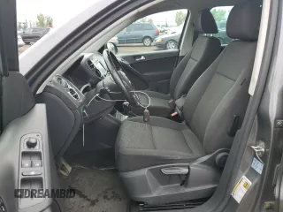 2017 Volkswagen Tiguan with VIN WVGHV7AX1HK017717, listed as a Copart auction lot 64948373 with 77,825 mi miles and Salvage title. Bid and sale history available at DreamBid. Image 7.