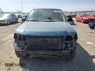 2010 Ford Escape XLS с VIN 1FMCU0C71AKC79020, выставлен на аукционе Copart как лот 52207675 с пробегом 188 415 миль миль и Списание • Salvage title. История ставок и продаж доступна на DreamBid. Изображение 5.