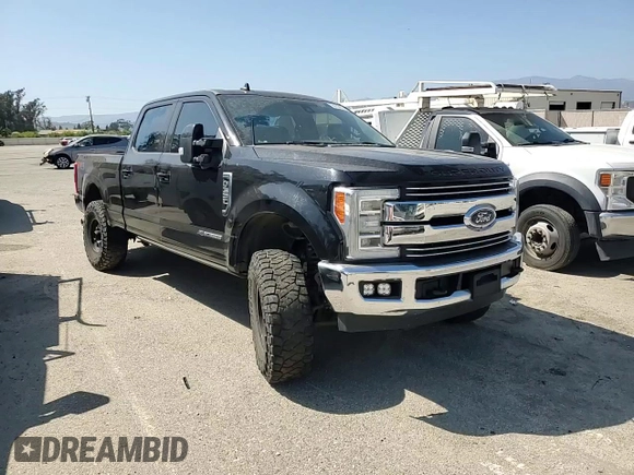 2019 Ford F-350 XL with VIN 1FT8W3BT0KED37509, listed as a Copart auction lot 60283655 with 122,571 mi miles and Salvage title. Bid and sale history available at DreamBid. Image 13.