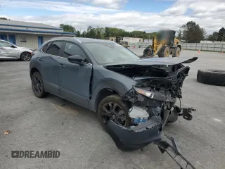 2024 Mazda CX-30 S Carbon Edition with VIN 3MVDMBCM9RM607345, listed as a Copart auction lot 56855925 with 19,295 mi miles and Salvage title. Bid and sale history available at DreamBid. Image 4.