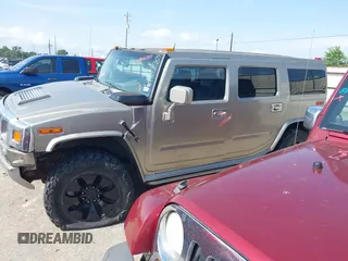 2004 Hummer H2 z VIN 5GRGN23U34H105809, wystawiony jako IAAI lot #42456055 z przebiegiem Nie podano mil oraz . Historia ofert i sprzedaży dostępna na DreamBid. Obrazek 14.
