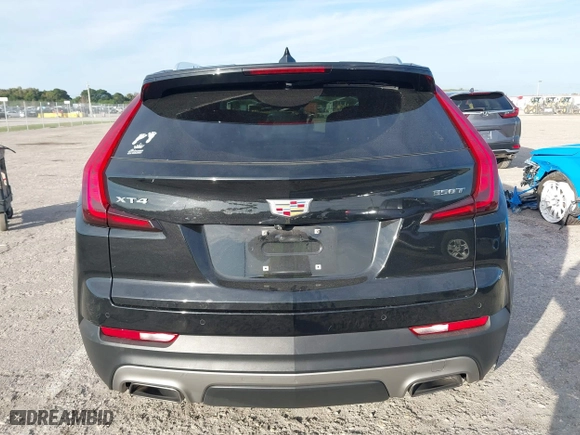2020 Cadillac XT4 FWD Premium Luxury with VIN 1GYFZCR44LF070832, listed as a IAAI auction lot 41249608 with 77,471 mi miles. Bid and sale history available at carsss.com. Image 16.