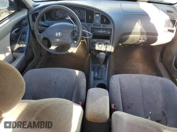 2004 Hyundai Elantra GLS z VIN KMHDN46D64U919337, wystawiony jako Copart lot #54627945 z przebiegiem 184 087 mil mil oraz Szkoda całkowita • Salvage title. Historia ofert i sprzedaży dostępna na DreamBid. Obrazek 8.