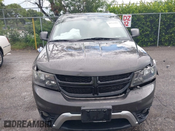 2020 Dodge Journey Crossroad with VIN 3C4PDCGB0LT270042, listed as a IAAI auction lot 40521806 with 102,934 mi miles and . Bid and sale history available at carsss.com. Image 6.