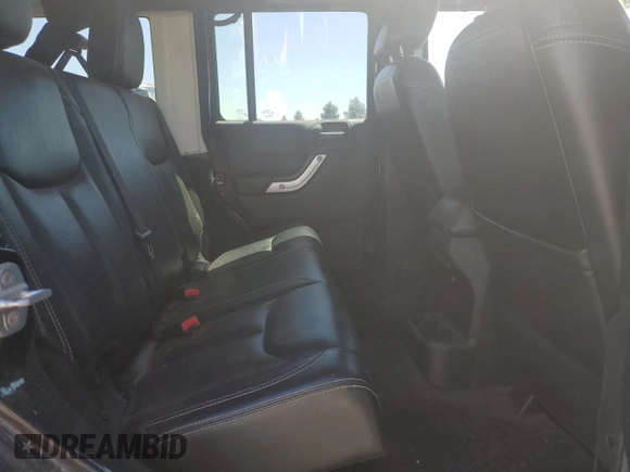 2014 Jeep Wrangler Unlimited Rubicon с VIN 1C4BJWFG7EL119344, выставлен на аукционе Copart как лот 65652265 с пробегом 150 934 миль миль и Списание • Salvage title. История ставок и продаж доступна на DreamBid. Изображение 11.