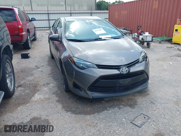 2018 Toyota Corolla L z VIN 5YFBURHE1JP855556, wystawiony jako IAAI lot #42273685 z przebiegiem 165 792 mil mil oraz . Historia ofert i sprzedaży dostępna na DreamBid. Obrazek 1.