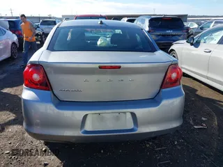 2014 Dodge Avenger SE with VIN 1C3CDZAB7EN144102, listed as a IAAI auction lot 41635691 with 201,428 mi miles and . Bid and sale history available at DreamBid. Image 16.