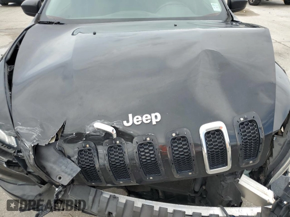 2015 Jeep Cherokee Sport with VIN 1C4PJLAB7FW517637, listed as a Copart auction lot 61385945 with 158,956 mi miles and Salvage title. Bid and sale history available at DreamBid. Image 12.