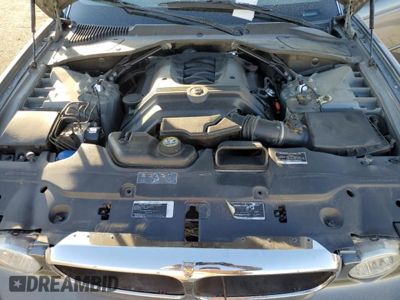 2004 Jaguar XJ with VIN SAJWA71C74SG20299, listed as a Copart auction lot 79469504 with 78,134 mi miles and Salvage Title. Bid and sale history available at carsss.com. Image 12.