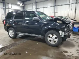 2012 Ford Escape XLT z VIN 1FMCU9D74CKB91598, wystawiony jako Copart lot #51667805 z przebiegiem 182 152 mil mil oraz Szkoda całkowita • Salvage title. Historia ofert i sprzedaży dostępna na DreamBid. Obrazek 4.