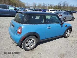 2013 MINI Hardtop with VIN WMWSU3C50DT682885, listed as a Copart auction lot 54238515 with 115,712 mi miles and Salvage Title. Bid and sale history available at DreamBid. Image 3.