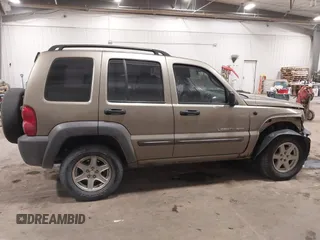 2003 Jeep Liberty Sport with VIN 1J4GL48K83W652993, listed as a IAAI auction lot 41086140 with 115,177 mi miles and . Bid and sale history available at DreamBid. Image 13.