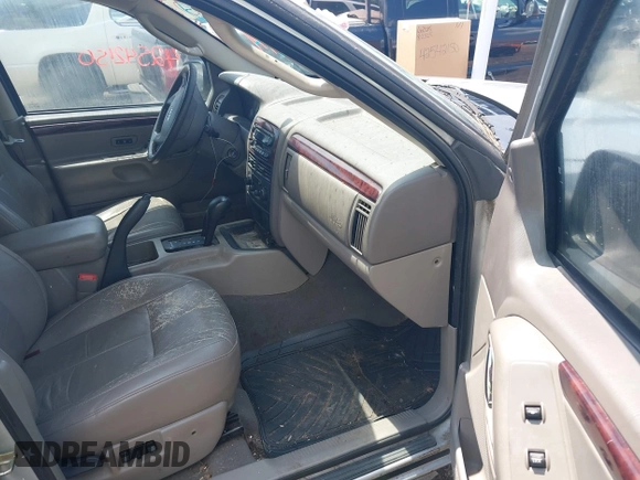 2004 Jeep Grand Cherokee Limited with VIN 1J4GW58N64C283657, listed as a IAAI auction lot 42542150 with 228,910 mi miles and . Bid and sale history available at DreamBid. Image 5.