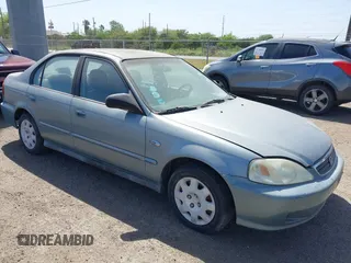 2000 Honda Civic VP with VIN 2HGEJ6616YH553654, listed as a IAAI auction lot 41551656 with 210,433 mi miles. Bid and sale history available at carsss.com. Image 1.
