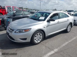 2011 Ford Taurus SE with VIN 1FAHP2DW3BG118603, listed as a IAAI auction lot 41944340 with 34,451 mi miles. Bid and sale history available at carsss.com. Image 2.