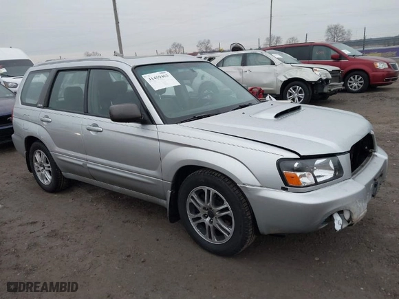 2004 Subaru Forester (Natl) XT with VIN JF1SG69694H733997, listed as a IAAI auction lot 41459463 with 219,973 mi miles. Bid and sale history available at carsss.com. Image 1.