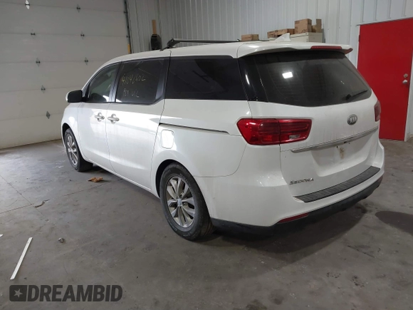 2019 Kia Sedona L with VIN KNDMA5C1XK6524868, listed as a IAAI auction lot 41048602 with 82,511 mi miles. Bid and sale history available at carsss.com. Image 3.