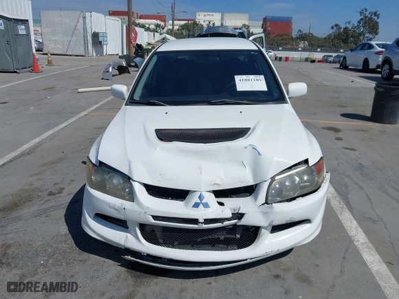 2005 Mitsubishi Lancer Evolution VIII with VIN JA3AH86DX5U054278, listed as a IAAI auction lot 41881180 with 157,497 mi miles. Bid and sale history available at carsss.com. Image 12.