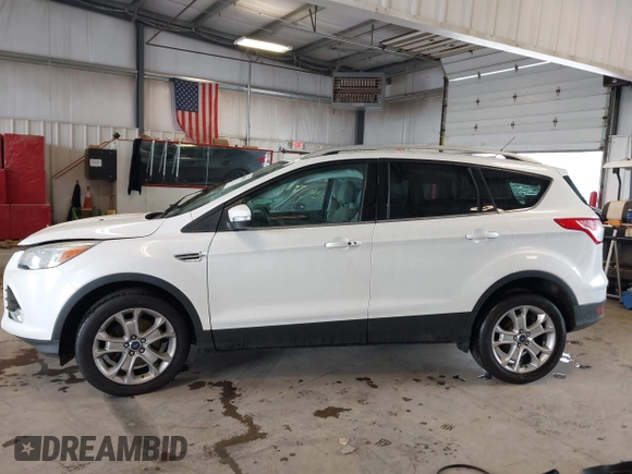 2016 Ford Escape Titanium with VIN 1FMCU9J90GUA18743, listed as a IAAI auction lot 42419730 with 102,666 mi miles and . Bid and sale history available at DreamBid. Image 15.