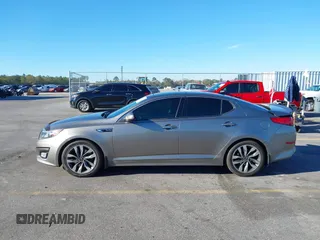 2015 Kia Optima SX Turbo with VIN 5XXGR4A66FG382167, listed as a IAAI auction lot 40951399 with 77,083 mi miles and . Bid and sale history available at DreamBid. Image 14.