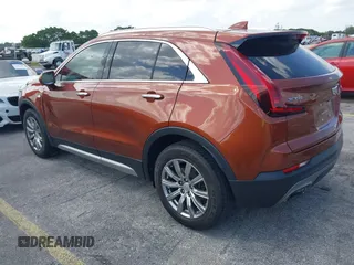 2019 Cadillac XT4 FWD Premium Luxury with VIN 1GYFZCR41KF183507, listed as a IAAI auction lot 41987176 with 64,803 mi miles and . Bid and sale history available at carsss.com. Image 3.