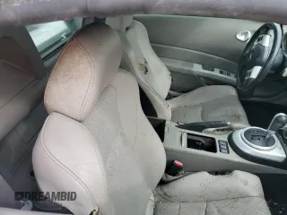 2006 Nissan 350Z Touring z VIN JN1AZ36A86M456456, wystawiony jako Copart lot #59199645 z przebiegiem 109 682 mil mil oraz Szkoda całkowita • Salvage title. Historia ofert i sprzedaży dostępna na DreamBid. Obrazek 10.