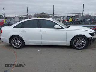 2013 Audi A6 Premium Plus with VIN WAUGFAFC6DN051237, listed as a IAAI auction lot 41553452 with 114,446 mi miles and . Bid and sale history available at DreamBid. Image 14.