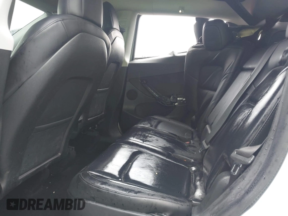 2021 Tesla Model Y Long Range with VIN 5YJYGAEE2MF260142, listed as a IAAI auction lot 41808666 with 87,316 mi miles and . Bid and sale history available at DreamBid. Image 8.