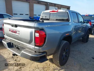 2024 GMC Canyon 4WD Elevation with VIN 1GTP6BEK9R1205603, listed as a IAAI auction lot 41485820 with 8,408 mi miles. Bid and sale history available at carsss.com. Image 4.