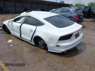 2014 Audi A7 Prestige z VIN WAU2GAFC7EN126780, wystawiony jako IAAI lot #42095865 z przebiegiem Nie podano mil oraz . Historia ofert i sprzedaży dostępna na DreamBid. Obrazek 3.