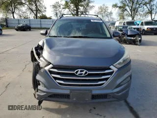 2017 Hyundai Tucson SE with VIN KM8J33A40HU330073, listed as a Copart auction lot 50713935 with 135,673 mi miles and Salvage Title. Bid and sale history available at DreamBid. Image 5.