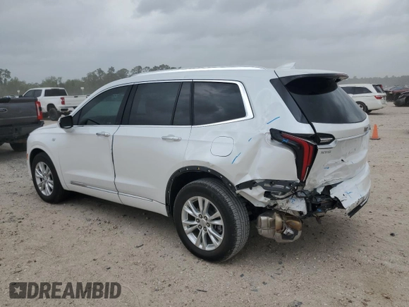 2024 Cadillac XT6 FWD Luxury with VIN 1GYKPAR47RZ720446, listed as a Copart auction lot 51762695 with 10,728 mi miles and Salvage Title. Bid and sale history available at carsss.com. Image 2.