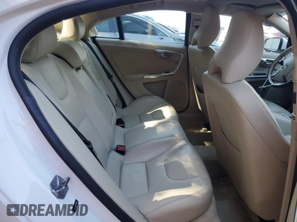 2016 Volvo S60 T5 Drive-E Premier z VIN YV126MFK8G2390619, wystawiony jako Copart lot #57810155 z przebiegiem 87 272 mil mil oraz Szkoda całkowita • Salvage title. Historia ofert i sprzedaży dostępna na DreamBid. Obrazek 10.