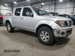 2006 Nissan Frontier SE with VIN 1N6AD07W86C406244, listed as a Copart auction lot 50157725 with 137,386 mi miles and Salvage title. Bid and sale history available at DreamBid. Image 4.