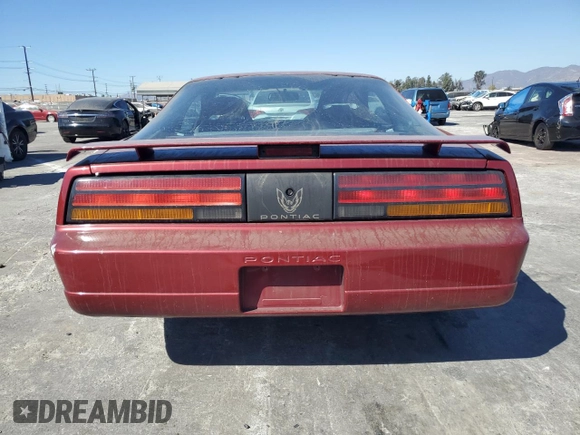 1990 Pontiac Firebird с VIN 1G2FS23T2LL206191, выставлен на аукционе Copart как лот 76175064 с пробегом 103 903 миль миль и Списание • Salvage title. История ставок и продаж доступна на DreamBid. Изображение 6.