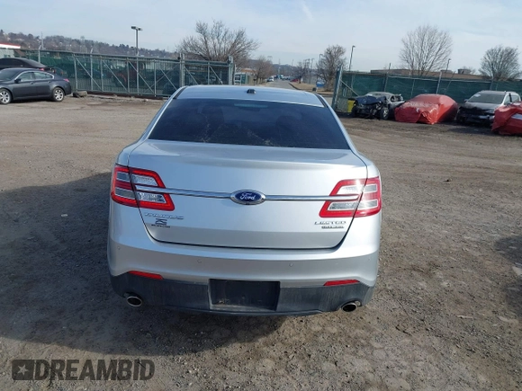 2014 Ford Taurus Limited with VIN 1FAHP2F86EG134779, listed as a IAAI auction lot 41660527 with 115,016 mi miles. Bid and sale history available at carsss.com. Image 16.