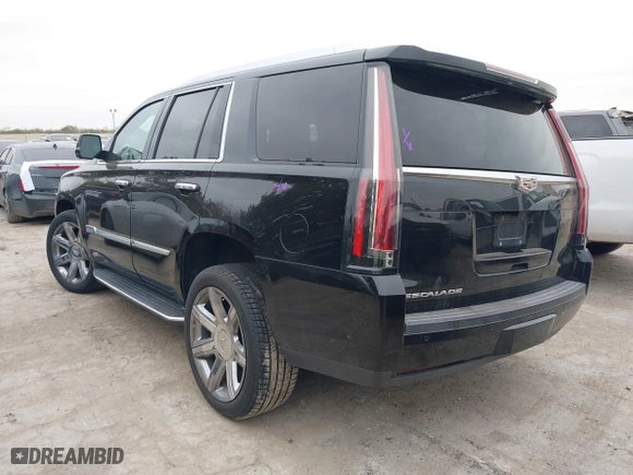 2018 Cadillac Escalade Luxury with VIN 1GYS4BKJ3JR143952, listed as a IAAI auction lot 41333902 with 124,265 mi miles. Bid and sale history available at carsss.com. Image 3.