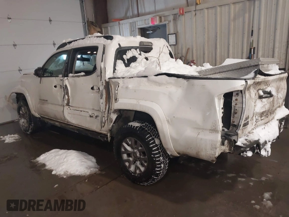 2016 Toyota Tacoma SR with VIN 3TMCZ5AN5GM004885, listed as a IAAI auction lot 41569409 with 143,951 mi miles. Bid and sale history available at carsss.com. Image 3.