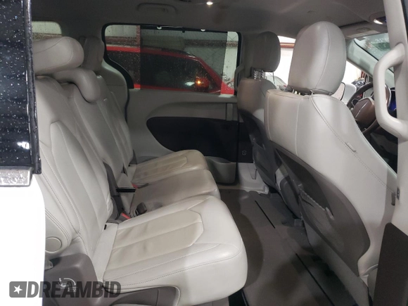 2020 Chrysler Pacifica Touring L with VIN 2C4RC1BGXLR128514, listed as a Copart auction lot 57333635 with 71,109 mi miles and Salvage title. Bid and sale history available at DreamBid. Image 11.
