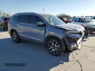 2022 Honda Pilot Elite z VIN 5FNYF6H0XNB060420, wystawiony jako Copart lot #50035415 z przebiegiem 37 288 mil mil oraz Szkoda całkowita • Salvage title. Historia ofert i sprzedaży dostępna na DreamBid. Obrazek 4.