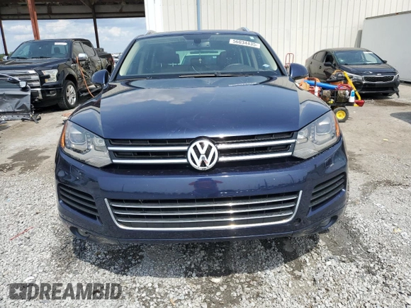 2013 Volkswagen Touareg Lux с VIN WVGEF9BP0DD002456, выставлен на аукционе Copart как лот 56034435 с пробегом 131 412 миль миль и Списание • Salvage title. История ставок и продаж доступна на DreamBid. Изображение 5.