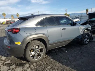 2022 Mazda MX-30 Premium Plus Package with VIN JM1DRADB1N0100687, listed as a Copart auction lot 79293853 with 13,075 mi miles. Bid and sale history available at carsss.com. Image 3.