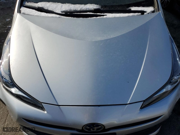 2021 Toyota Prius L Eco with VIN JTDKAMFU3M3147845, listed as a Copart auction lot 88705855 with 59,418 mi miles and Salvage Title. Bid and sale history available at carsss.com. Image 12.