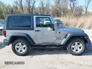 2015 Jeep Wrangler Sport with VIN 1C4GJWAG0FL503254, listed as a IAAI auction lot 41931666 with 115,394 mi miles. Bid and sale history available at carsss.com. Image 13.